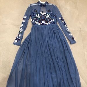 Blue flow beaded tulle gown